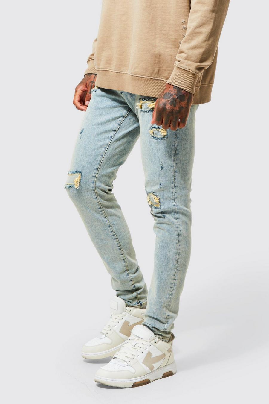 כחול עתיק סקיני ג'ינס נמתח עם קרעים וטלאים image number 1