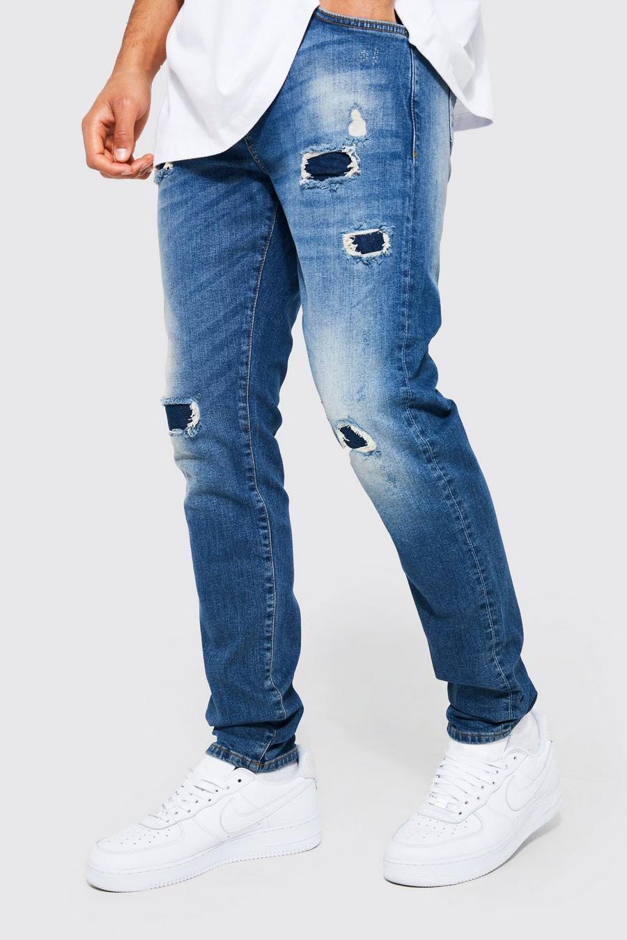 Mid blue blå Skinny jeans med slitage och lagningar image number 1