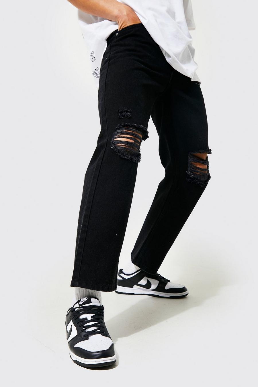 Washed black Ankellånga jeans med slitna knän