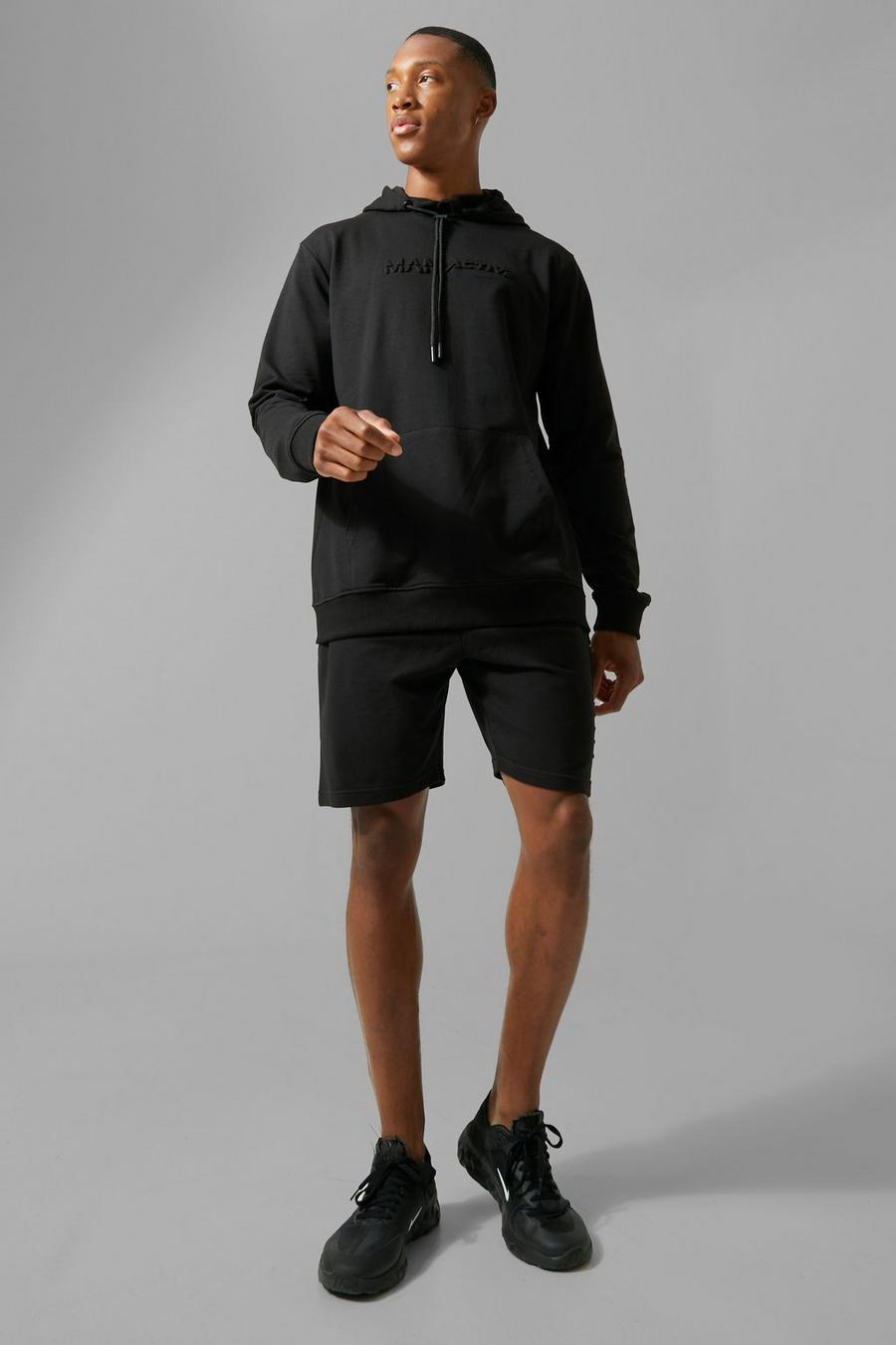 שחור black חליפת טרנינג ספורטיבית עם שורט וכיתוב Man מוטבע image number 1