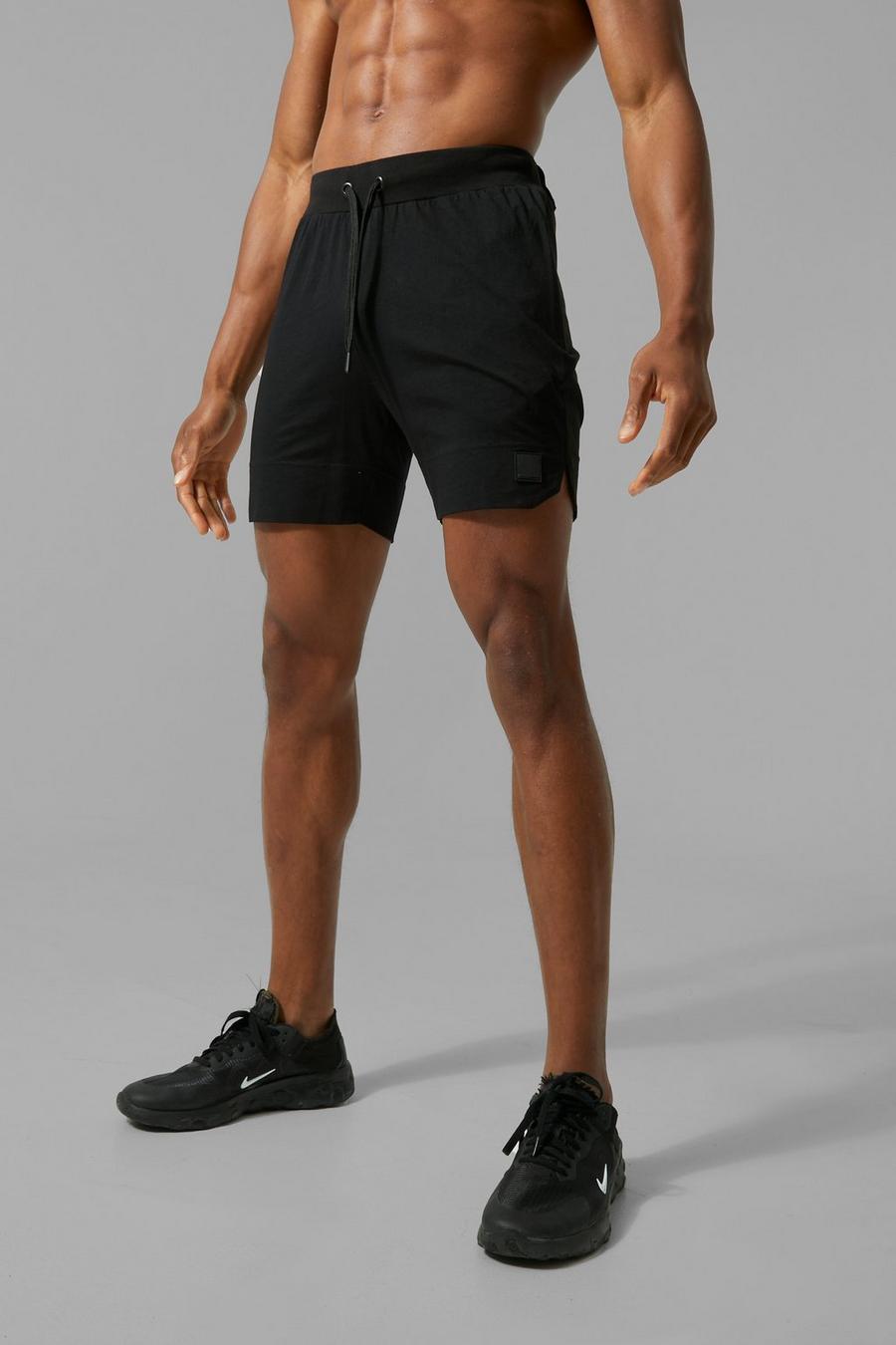 Man Active Muscle-Fit Shorts, Black schwarz image number 1