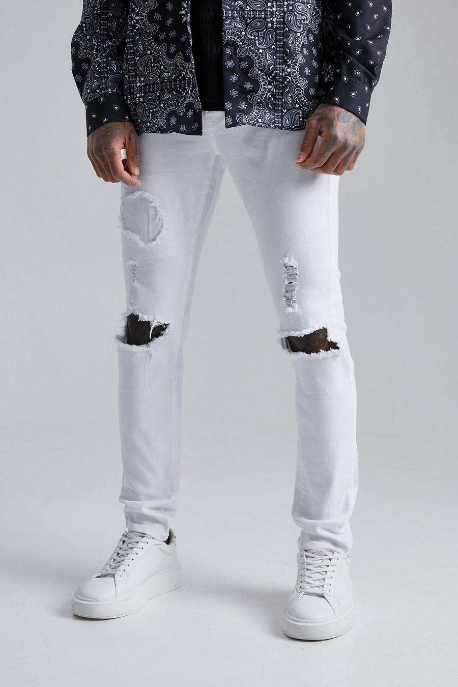 לבן סקיני ג'ינס נמתח עם קרעים וטלאים image number 1