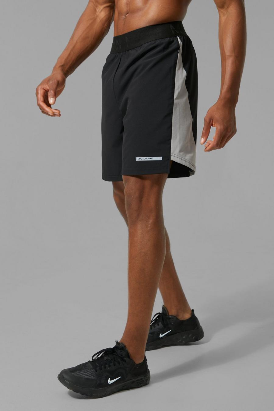 Black Man Active Panelled Nylon Shorts image number 1
