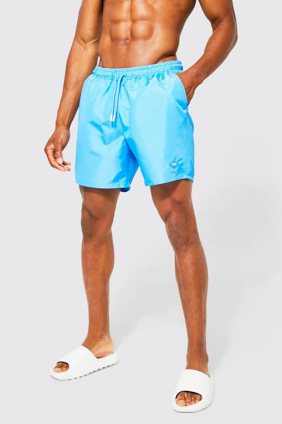 Blue Mid Length Man Tab Swim Shorts image number 1