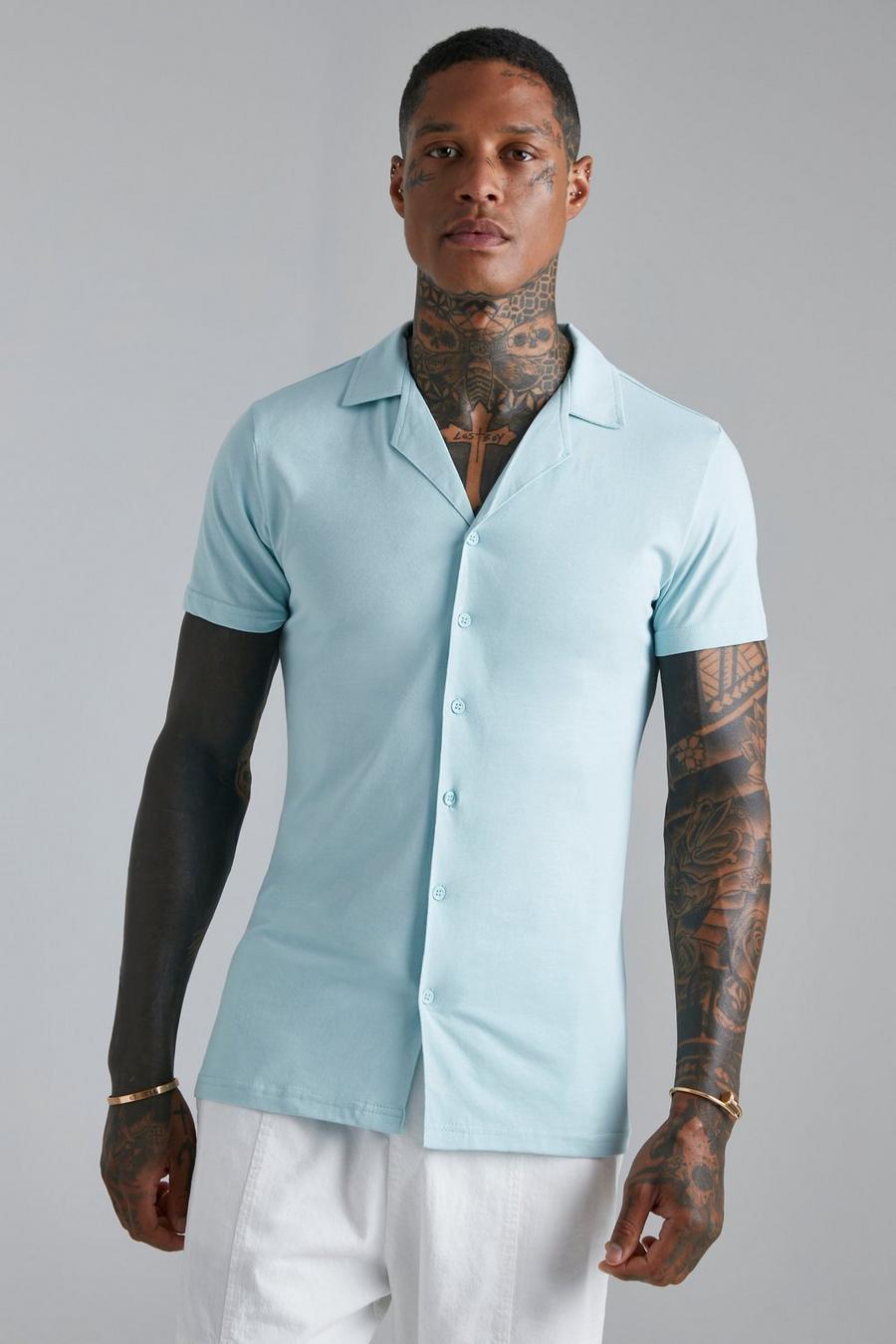 Camisa ajustada al músculo de tela jersey y manga corta con solapas, Light blue azul image number 1