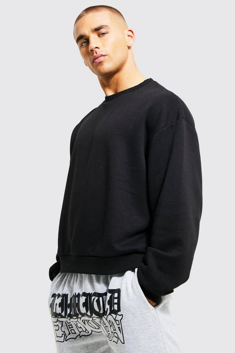 Black svart Sweatshirt i boxig modell