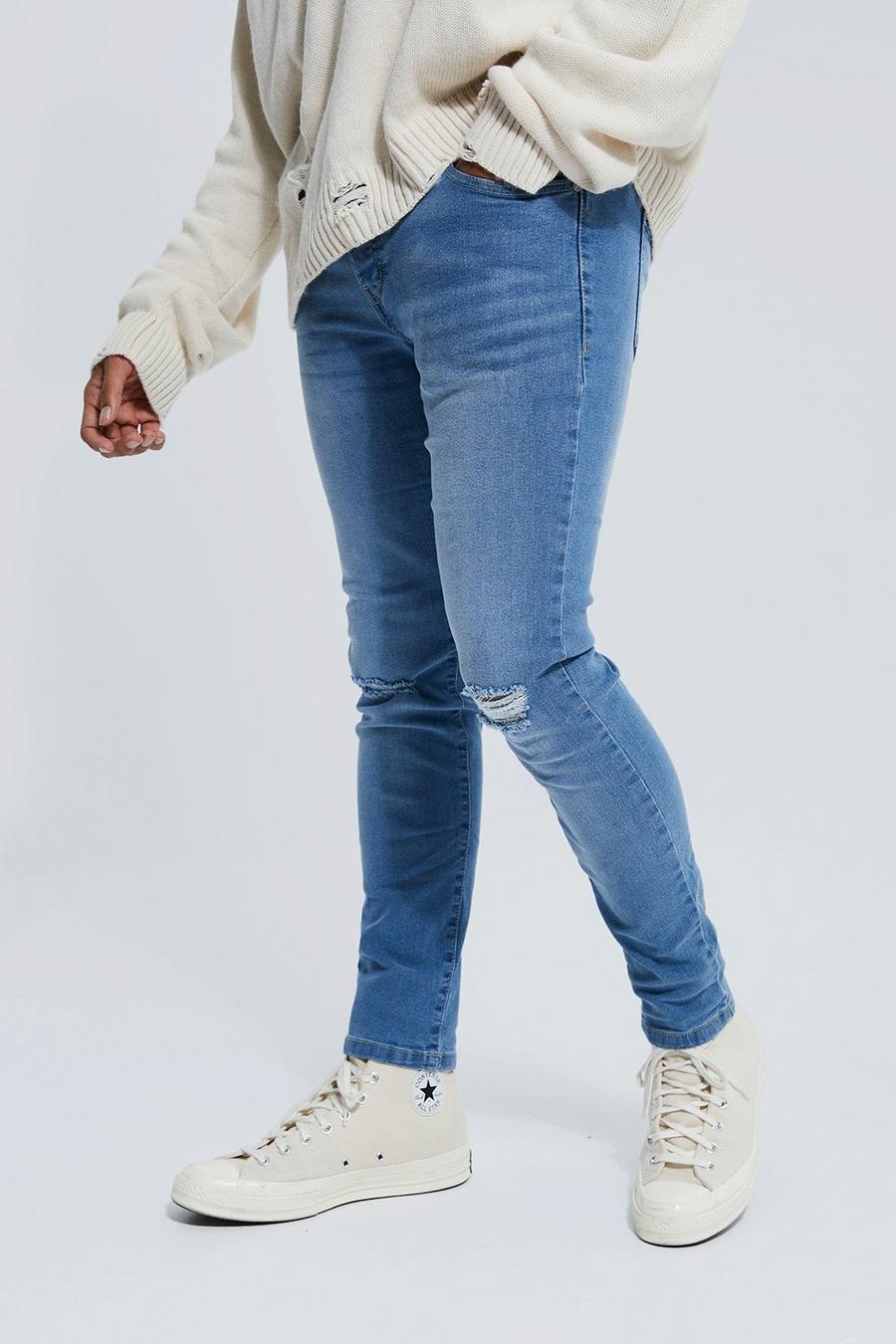 כחול בהיר סקיני ג'ינס סטרץ' עם קרע בברך image number 1