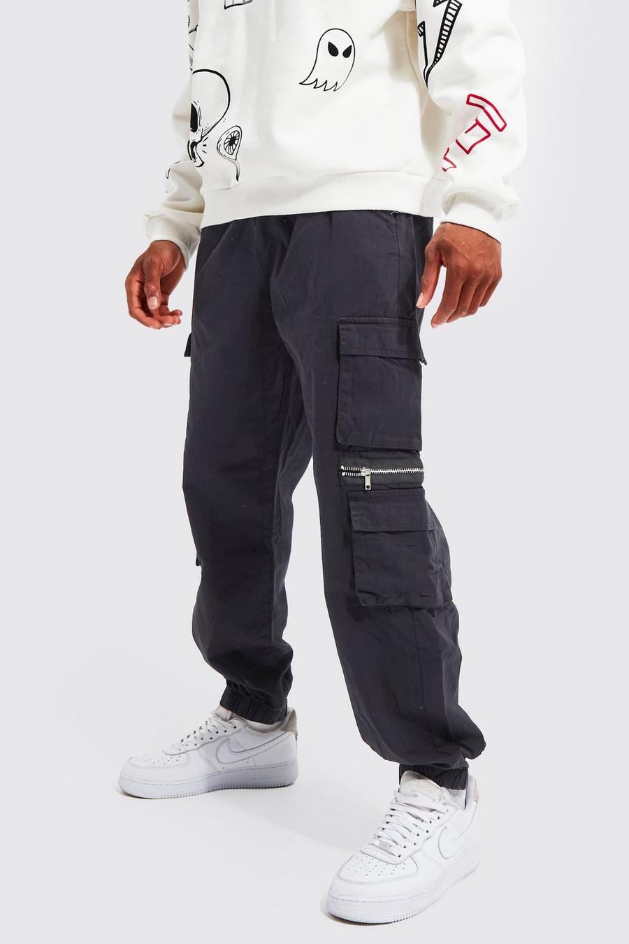 Elasticated Waist Multi Pocket Zip Cargo Trouser | boohoo Elasticated Waist Multi Pocket Zip Cargo Trouser | boohoo
