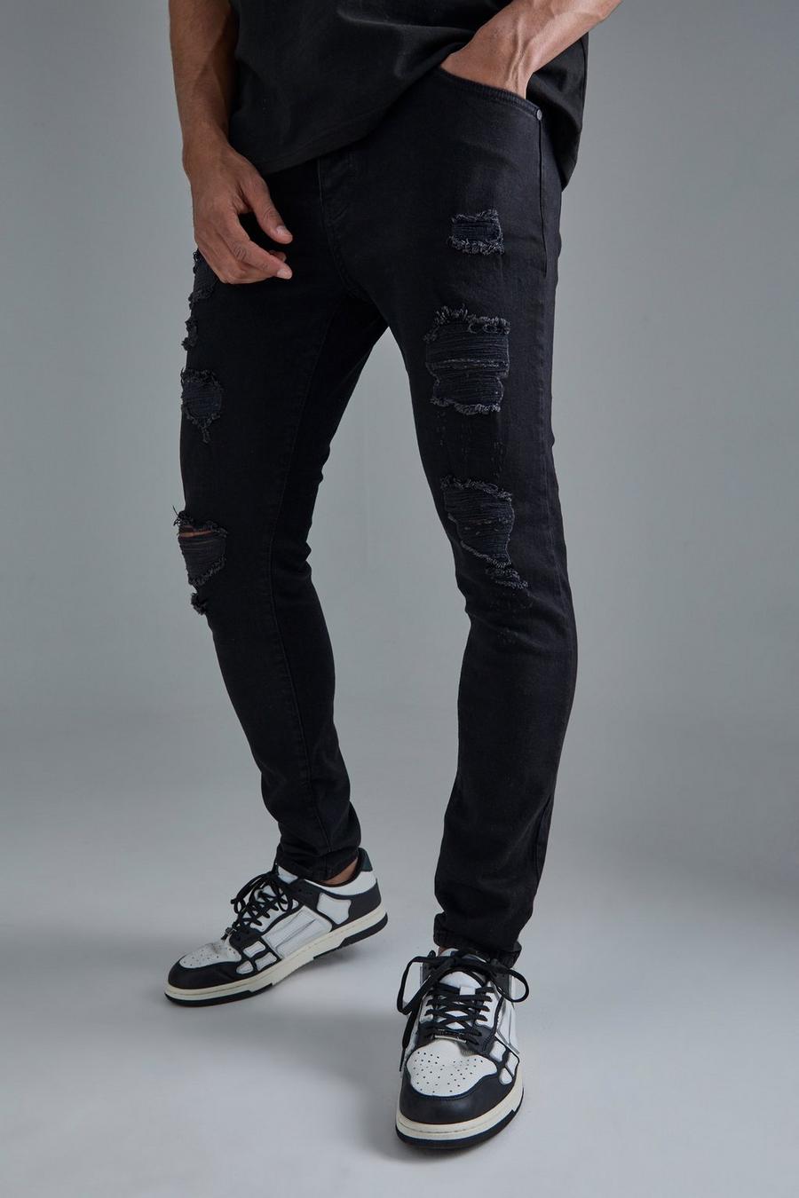 שחור אמיתי סקיני ג'ינס נמתח עם קרעים לכל האורך