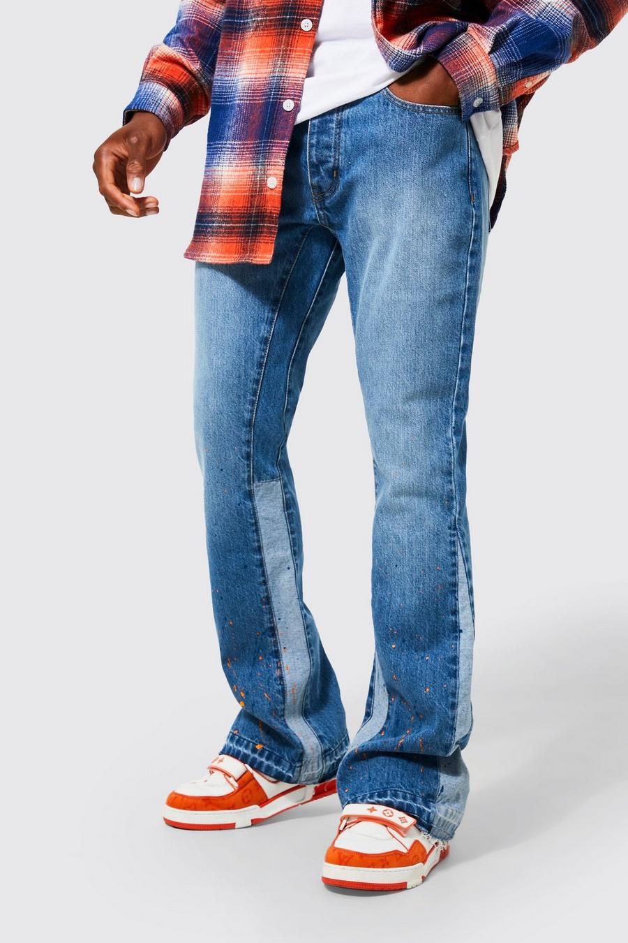 כחול בהיר ג'ינס בגזרת סקיני עם כתמי התזת צבע ופאנלים