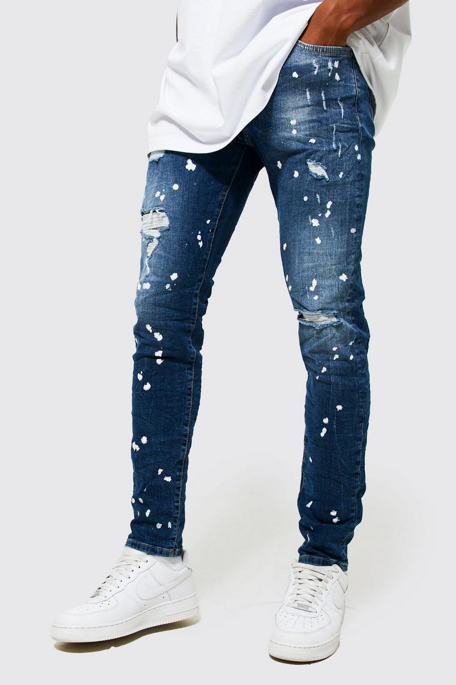 Dark blue Slitna skinny jeans med färgstänk image number 1