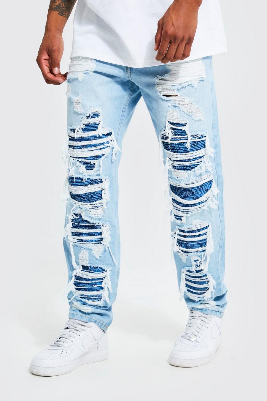 Ice blue Slitna jeans med lagningar image number 1