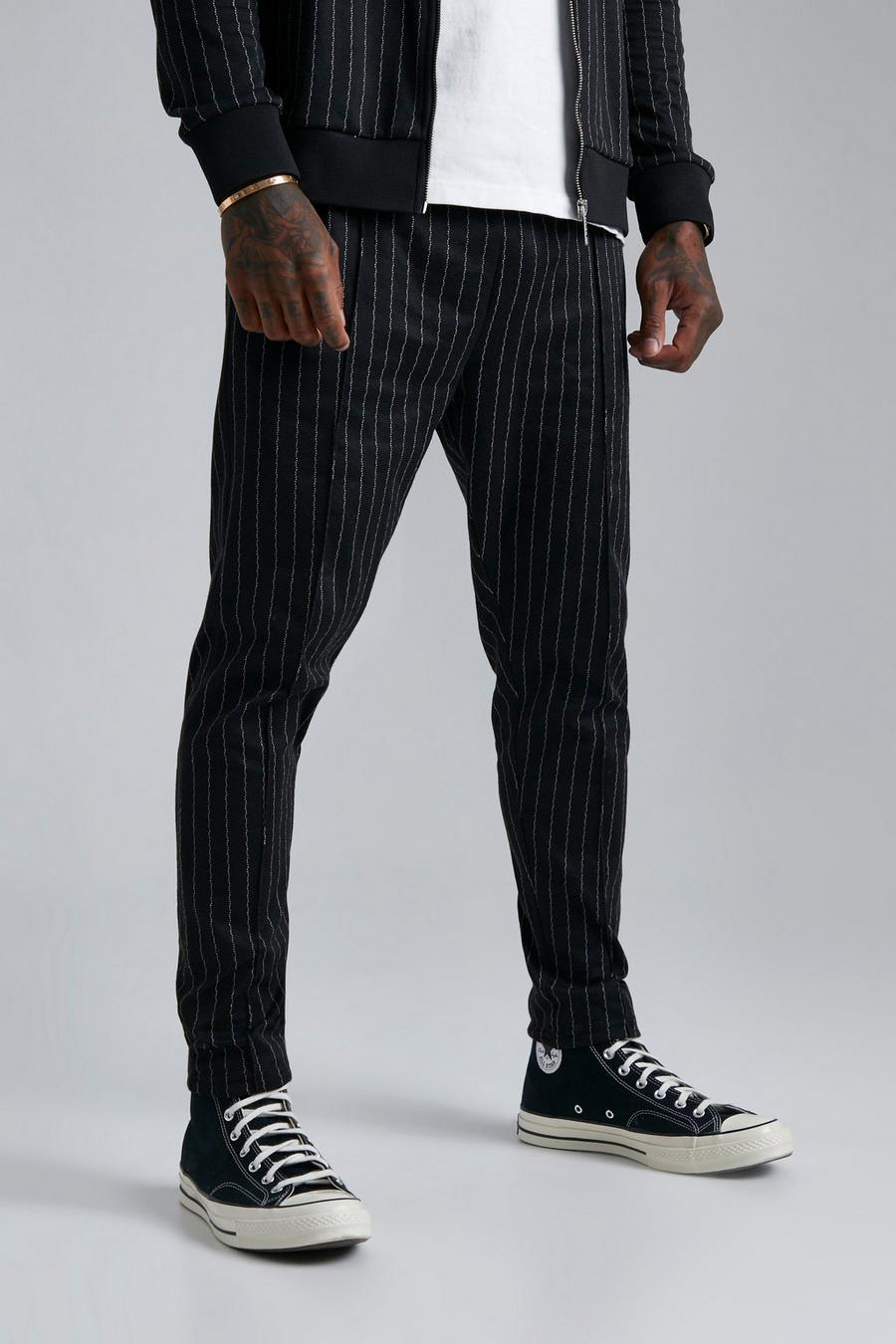 Pantalón deportivo pitillo de jacquard con rayas fina y alforza, Black image number 1
