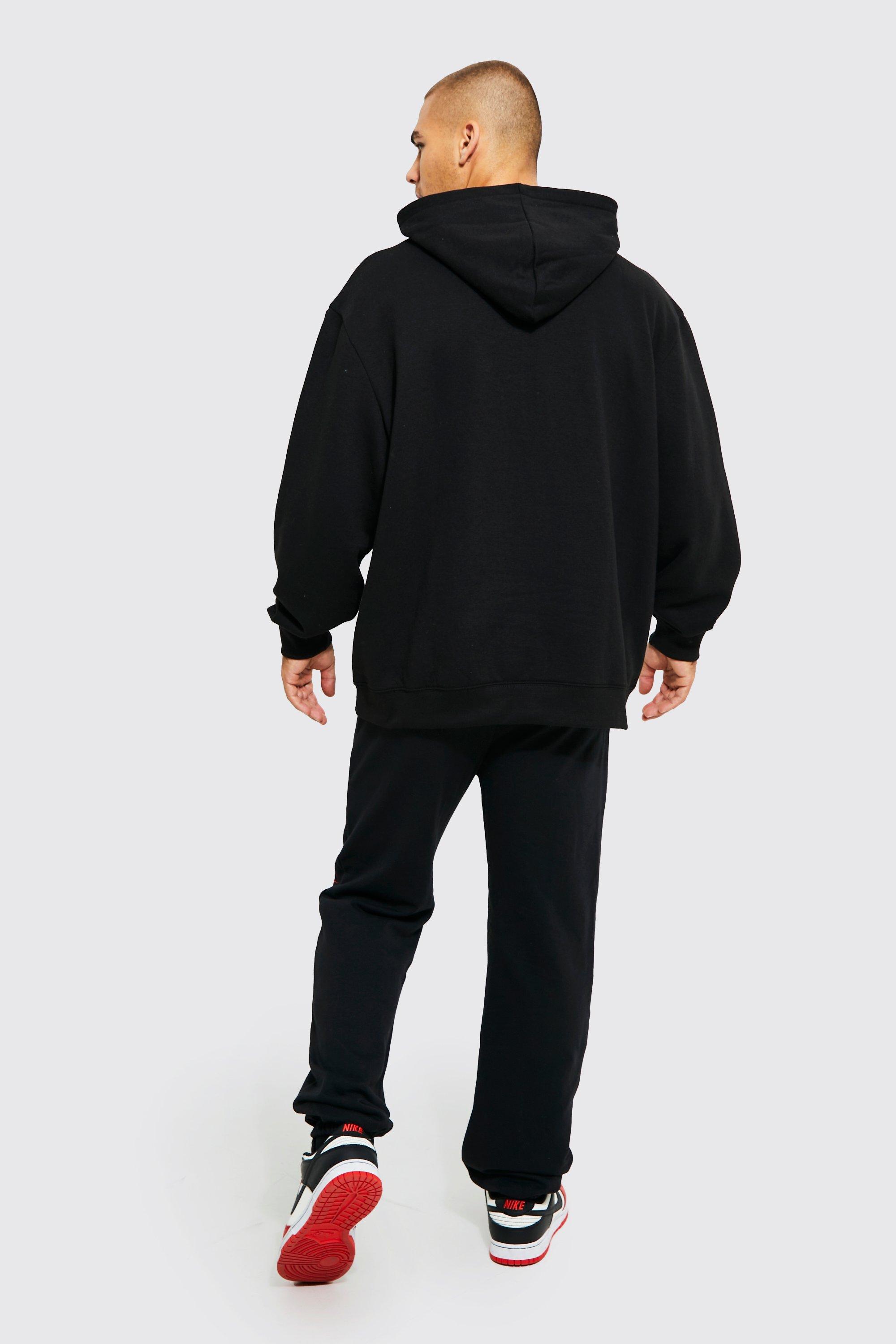 Nike mini Swoosh oversized joggers in black, £25.00