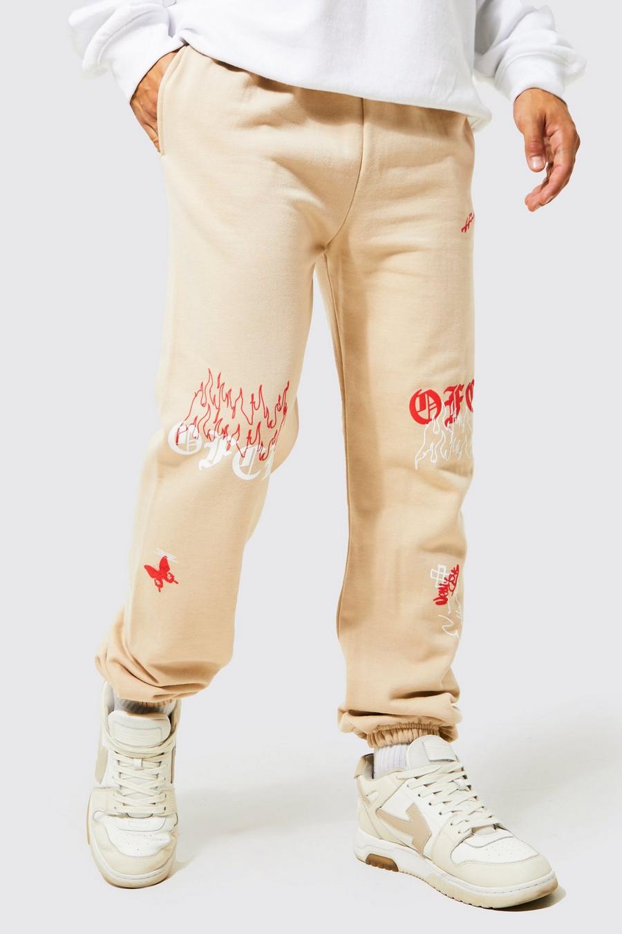 Pantalón deportivo Regular con grafiti y estampado en relieve, Sand image number 1