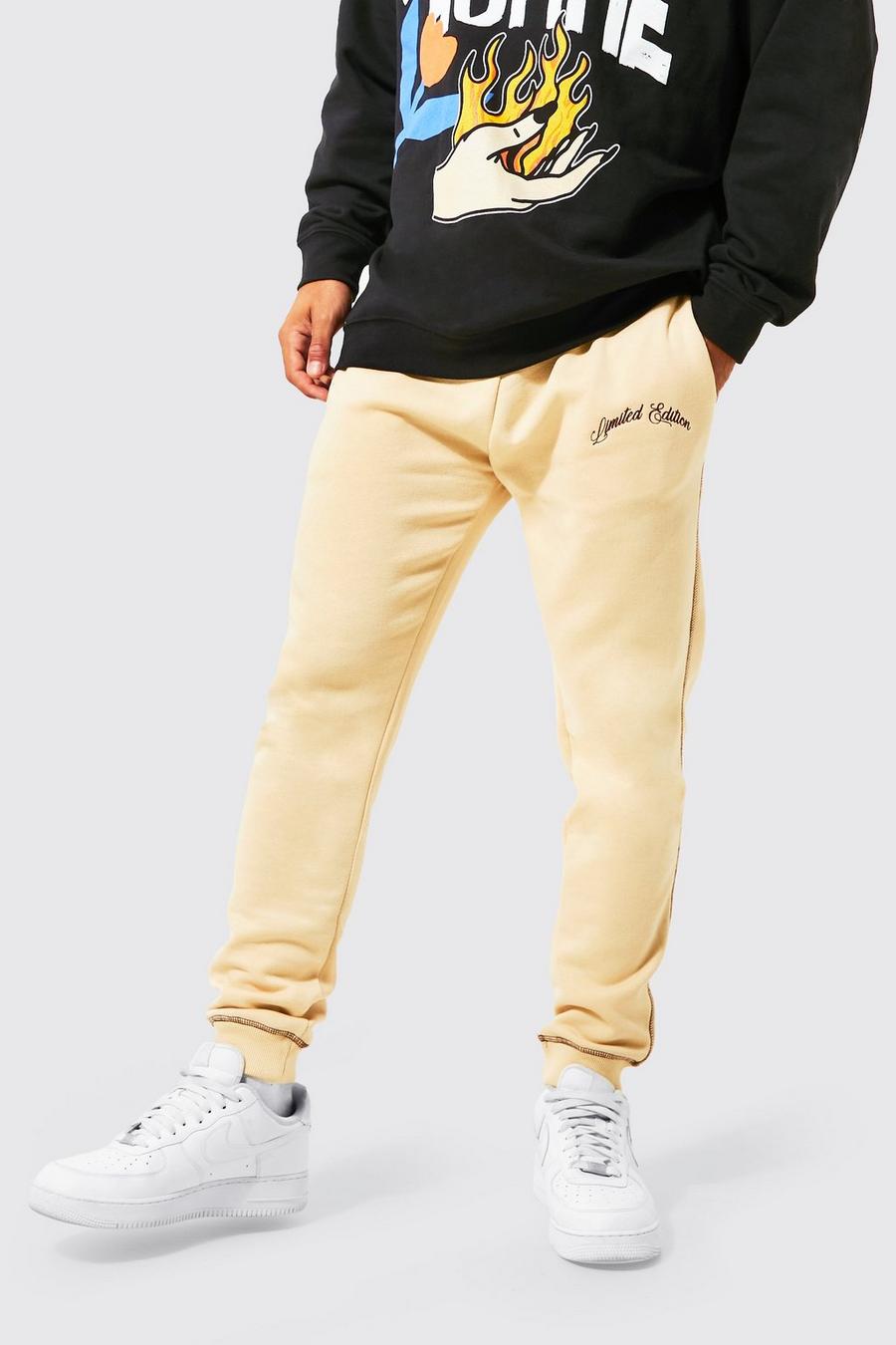Sand Oversized Contrast Stitch Graphic Joggers image number 1