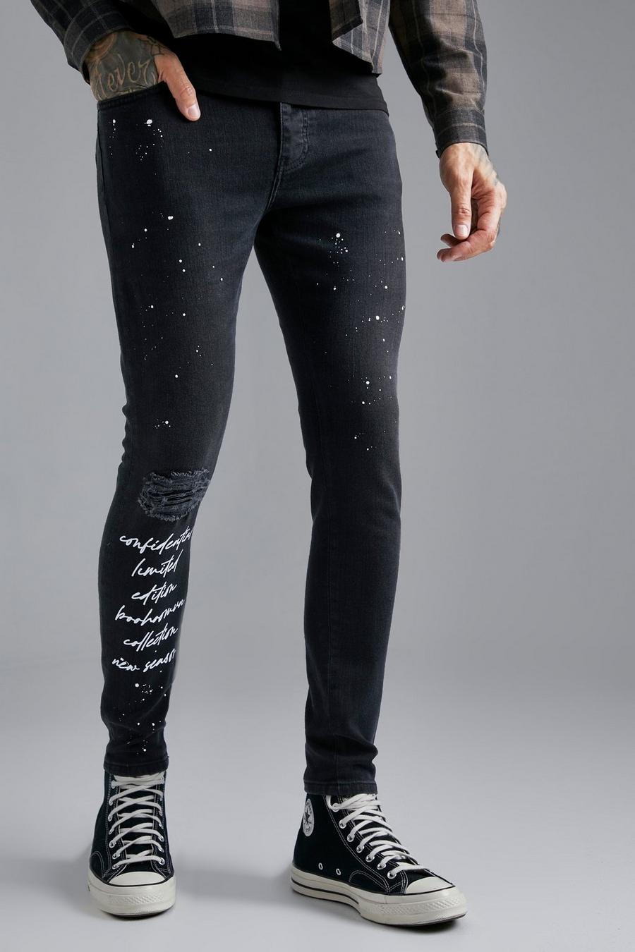 Washed black Slitna skinny jeans med färgstänk image number 1