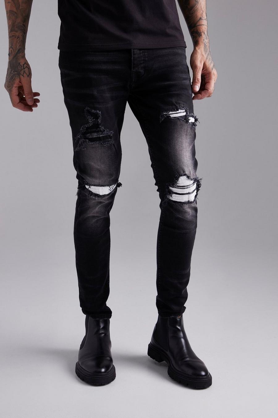 Washed black Skinny Rip & Repair Paint Splatter Jeans image number 1