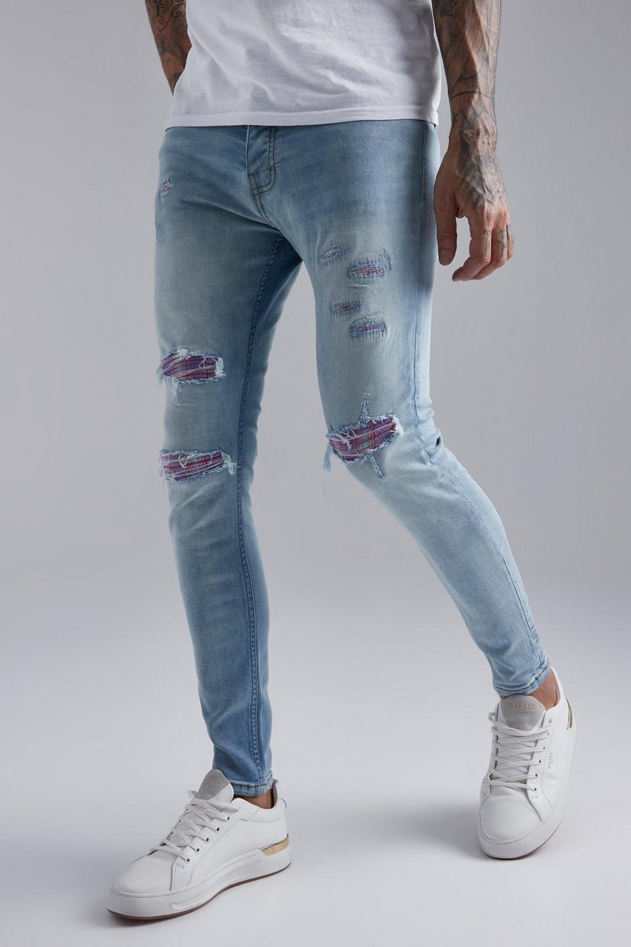Light blue Slitna skinny jeans med rutiga lagningar image number 1