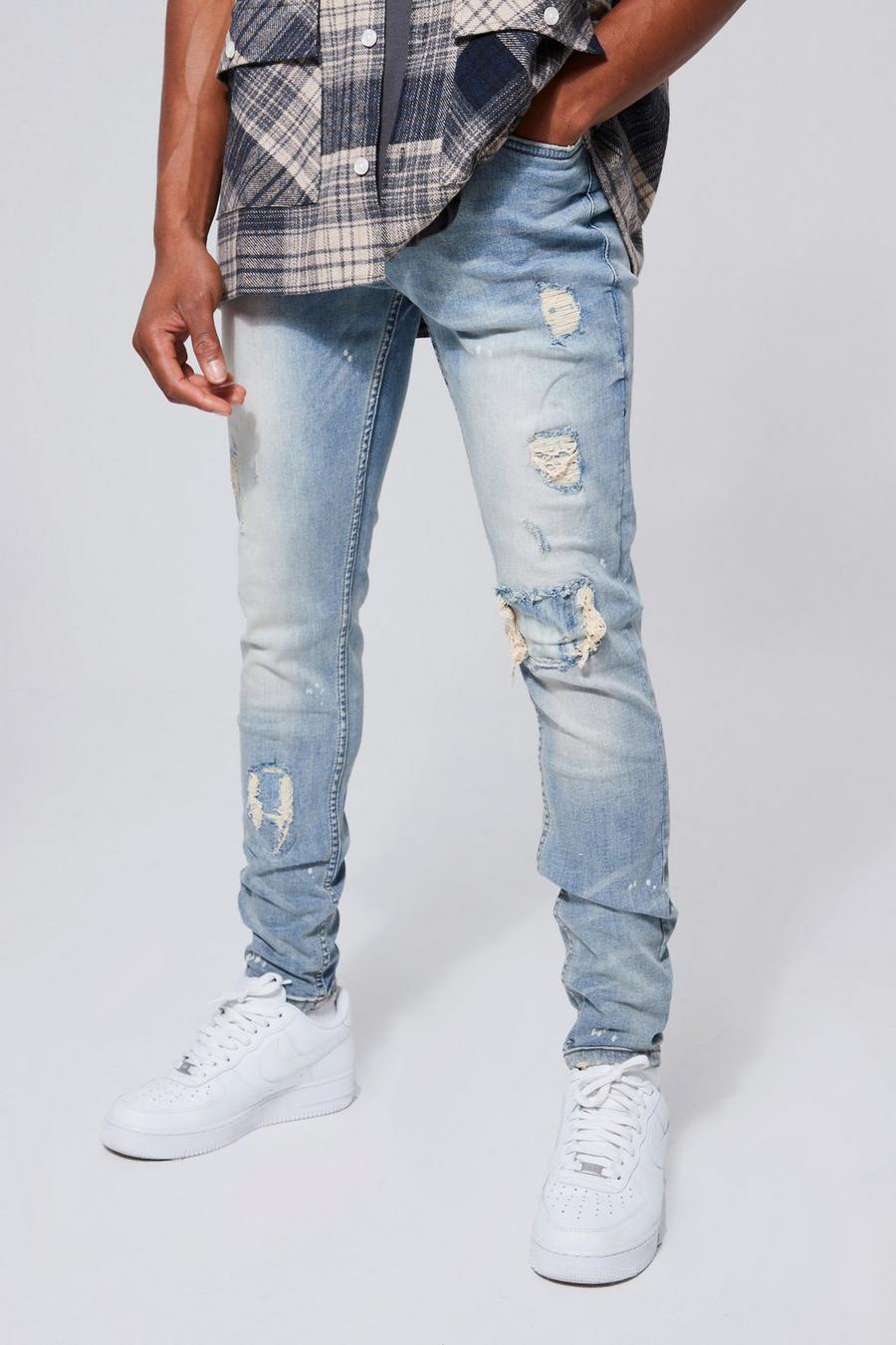 Light blue Gebleekte Stretch Rip & Repair Skinny Jeans Met Verfspetters image number 1