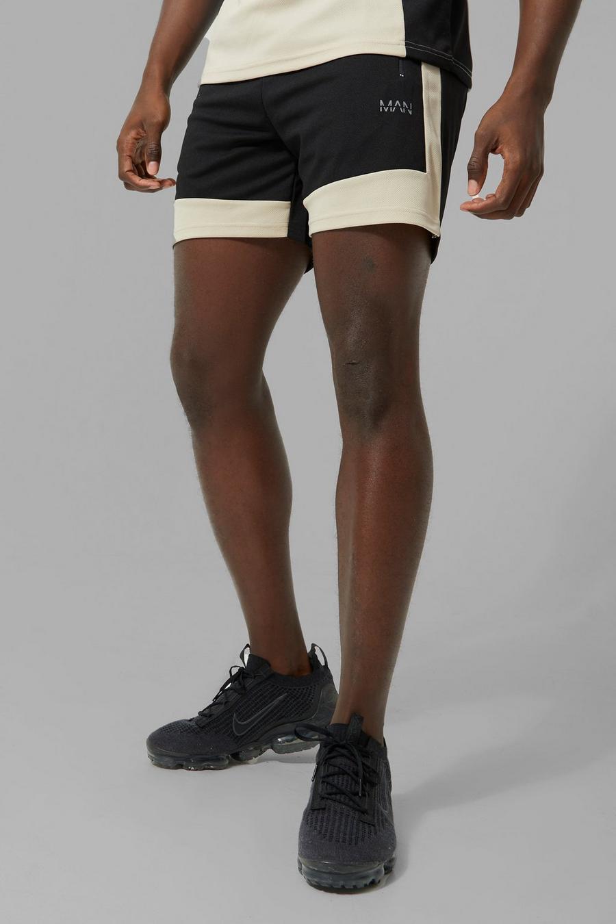 Black Man Active Contrasterende Fitness Shorts image number 1