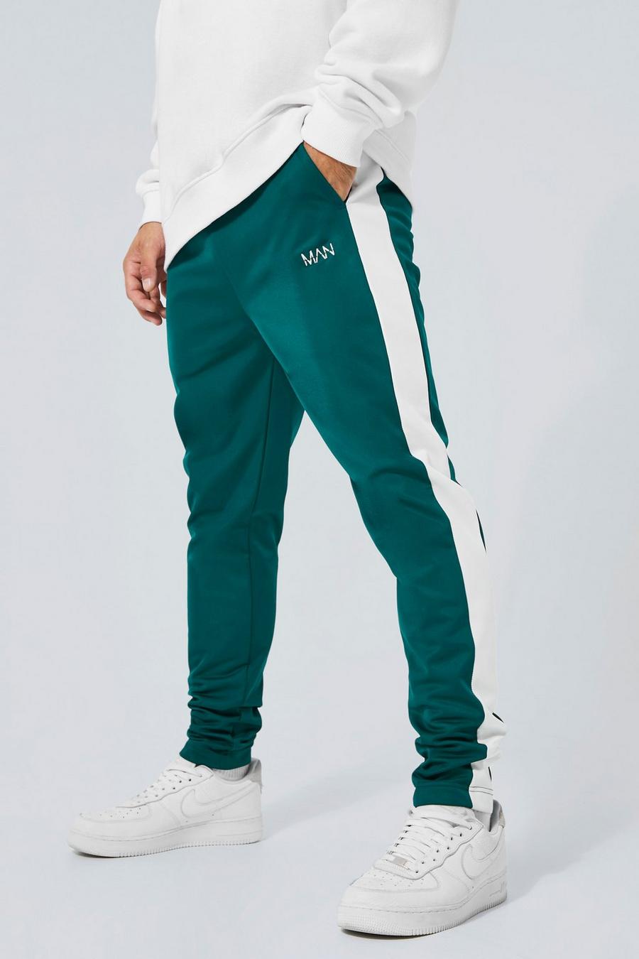 Pantaloni tuta Man Skinny Fit con pannelli laterali in tricot, Forest verde