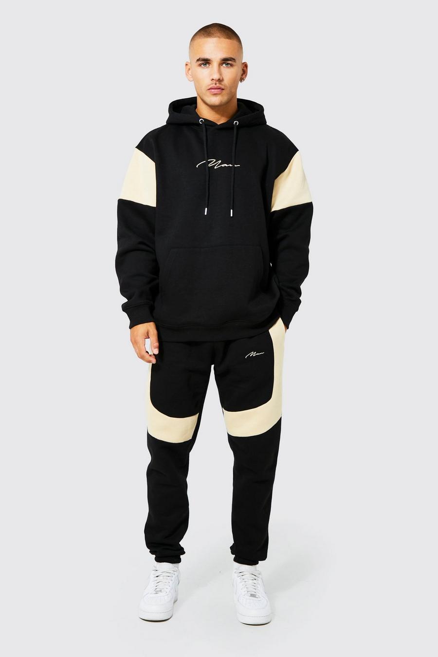 Black MAN Träningsoverall med oversize hoodie och blockfärger image number 1