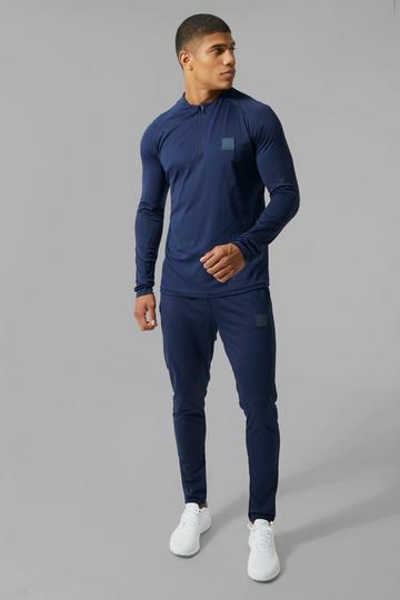 Man Active Skinny Crew Neck 1/4 Zip Tracksuit navy