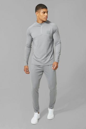 Man Active Skinny Crew Neck 1/4 Zip Tracksuit grey