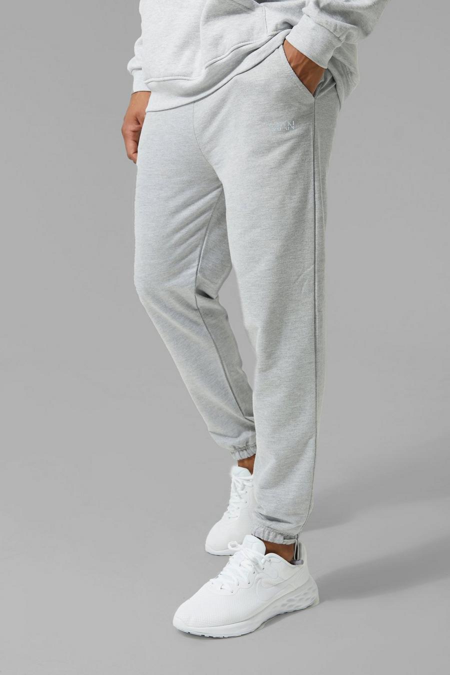 Pantaloni tuta Man Active con polsini alle caviglie e fermacorde, Grey marl image number 1