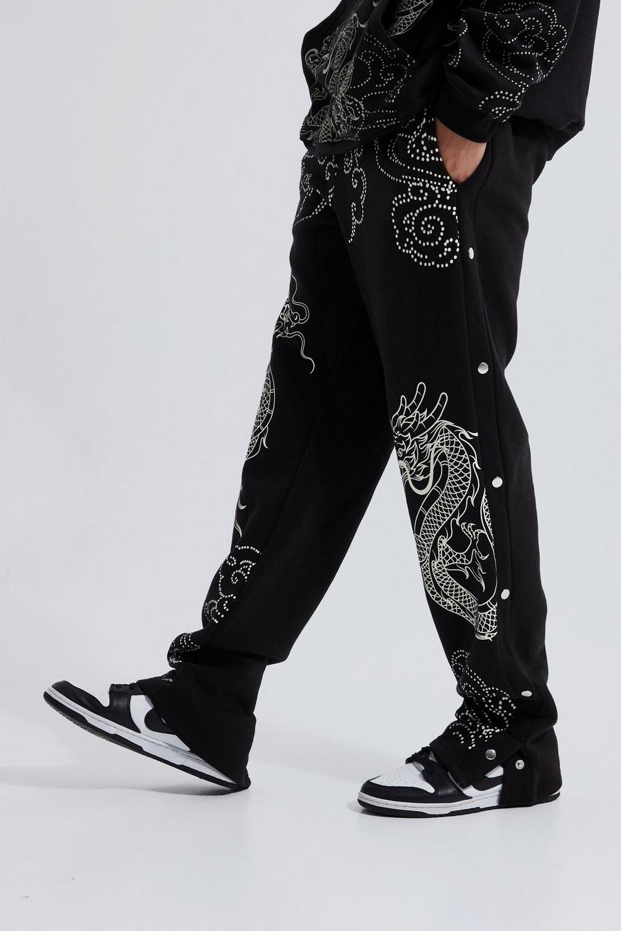 Pantalón deportivo Tall holgado con estampado de dragón y botones de presión latrales, Black