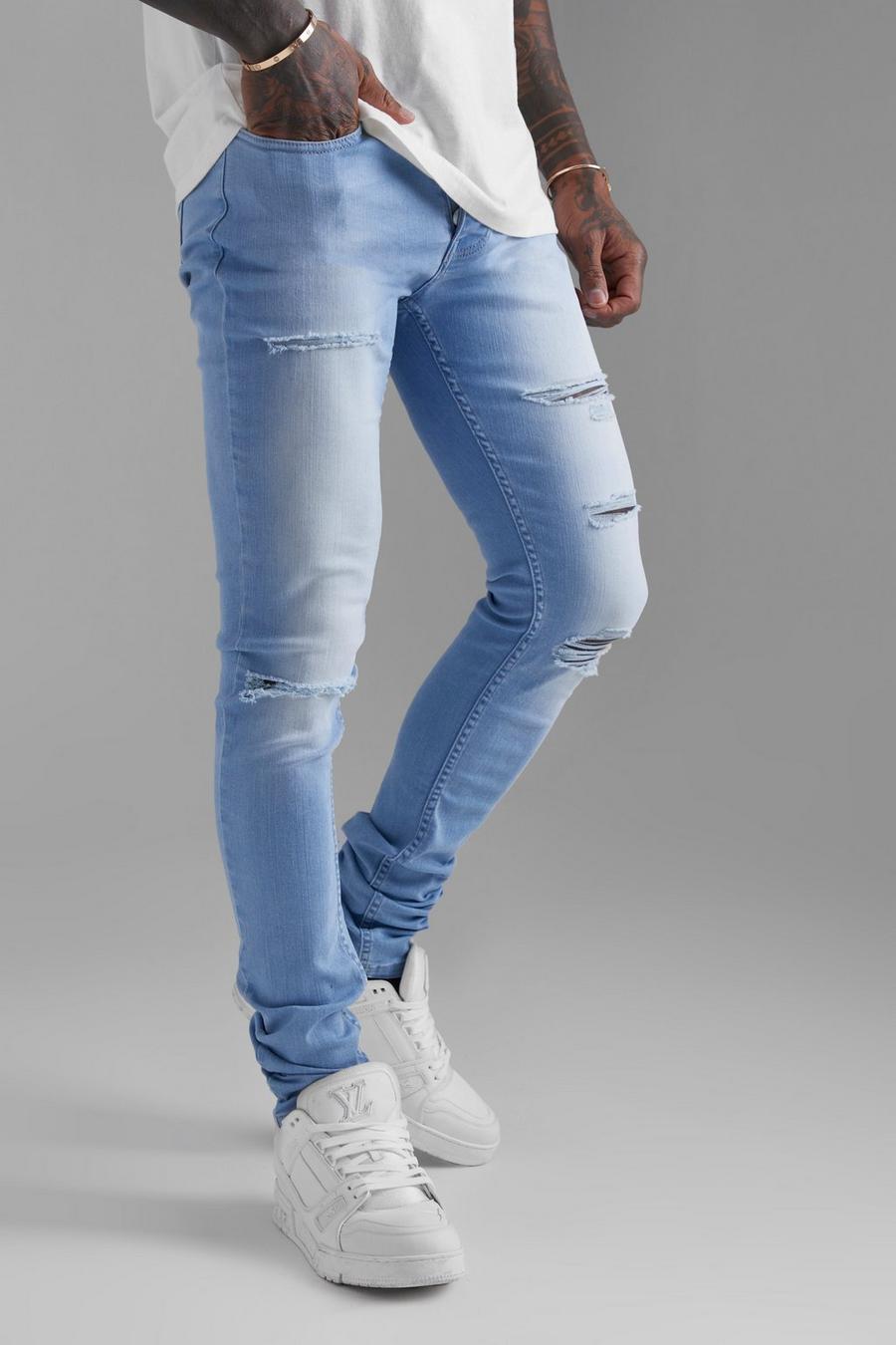 Jeans Skinny Fit in denim Stretch con strappi e pieghe sul fondo, Light blue image number 1