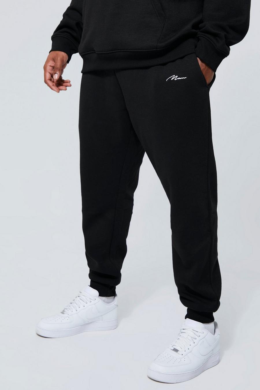 שחור מכנסי טרנינג בייסיק סקיני בסגנון דגמ"ח עם כיתוב Man, מידות גדולות image number 1