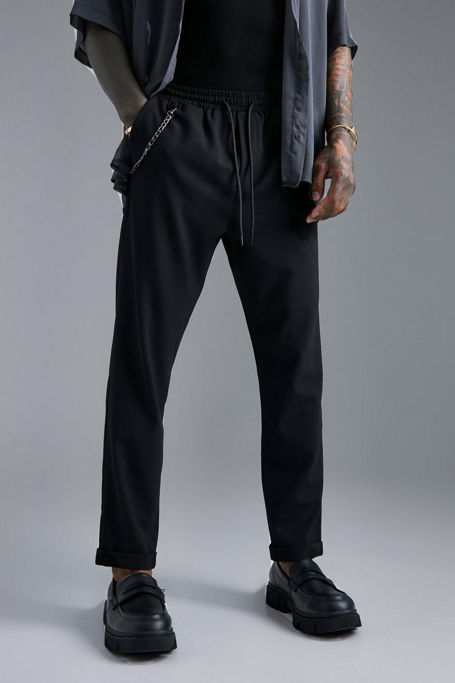 שחור black מכנסיים בגזרת קרסול צרה עם מכפלת מקופלת ועיטור שרשרת
