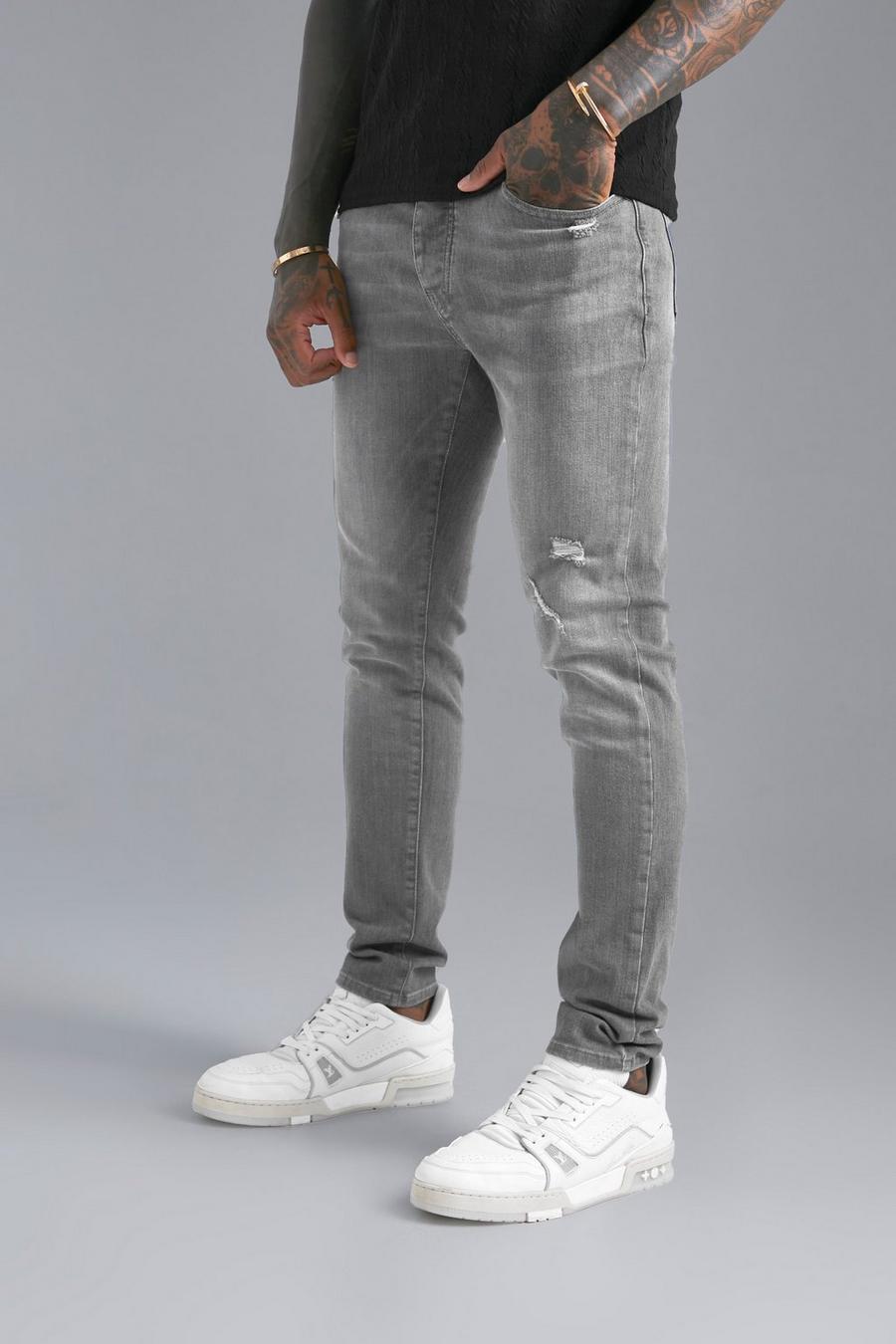 Mid grey grå Skinny jeans med slitage och stretch image number 1