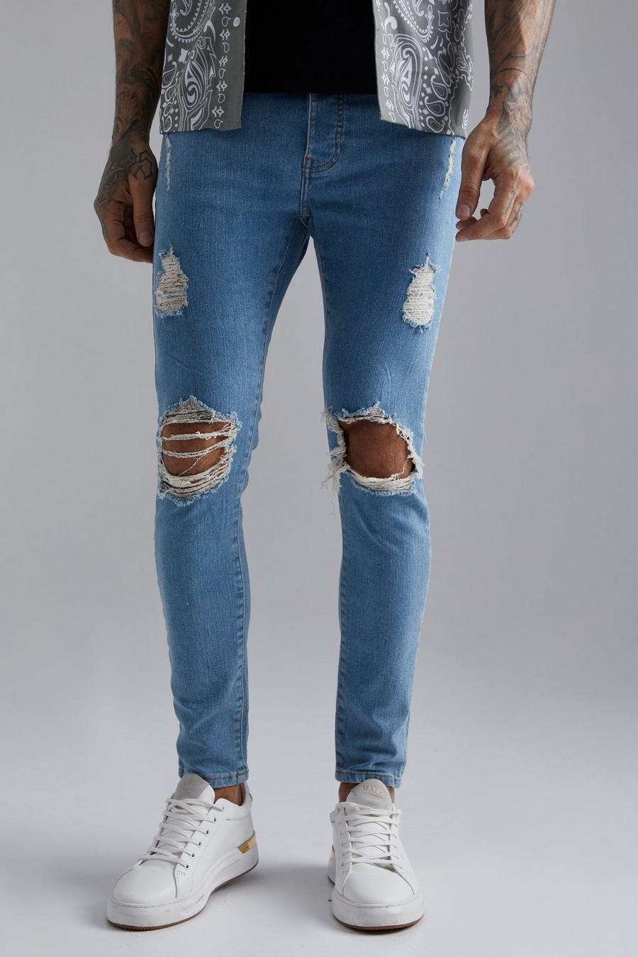 Antique wash blue Skinny Stretch Exploded Knee Ripped Jeans  