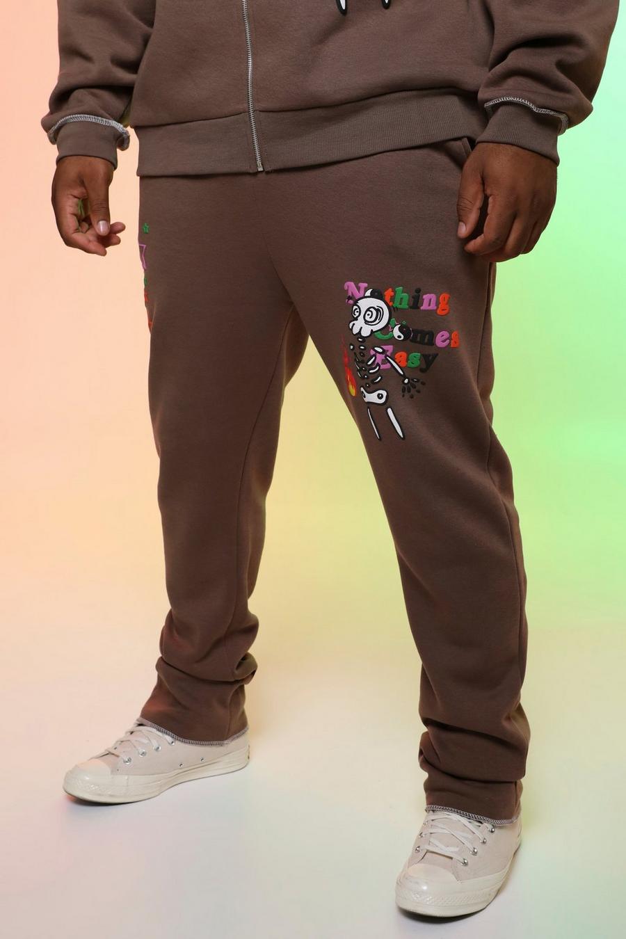 שוקולד מכנסי טרנינג עם הדפס גרפי של שלד ותפרים בצבעים מנוגדים, לגברים גבוהים image number 1