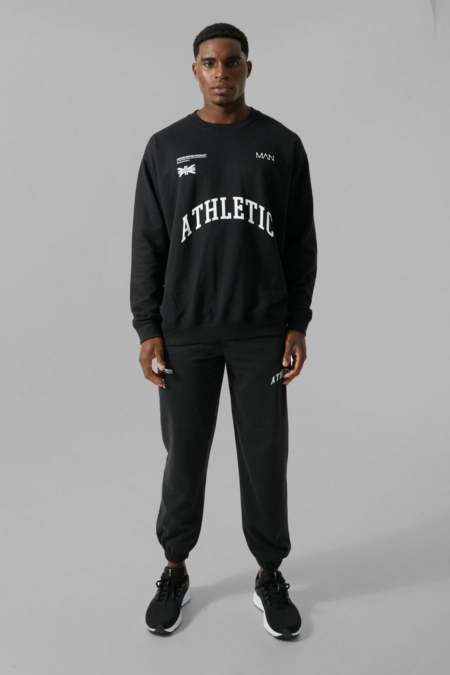 Black MAN Active Athletic Oversized träningsoverall med sweatshirt image number 1