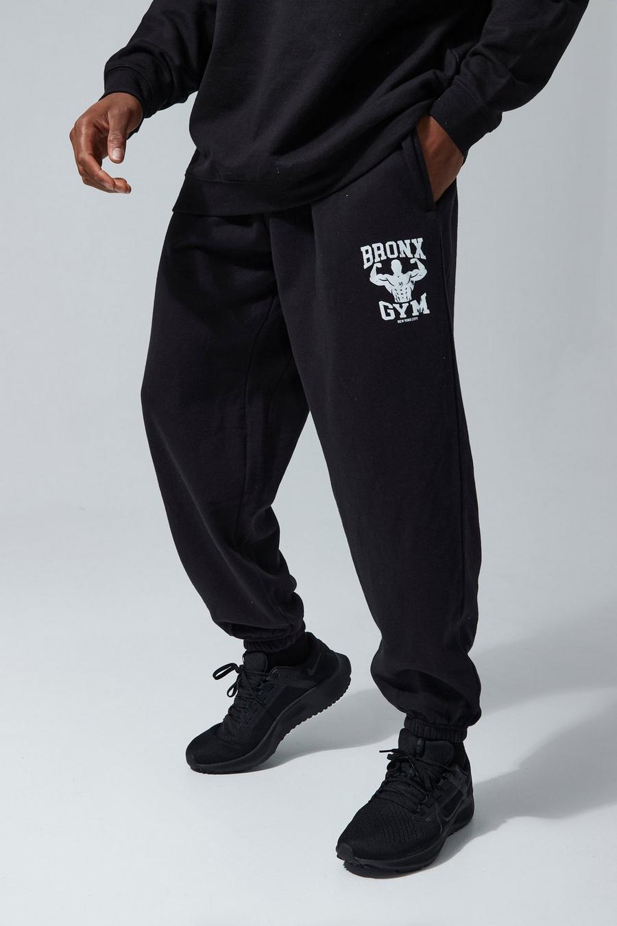 Pantalón deportivo MAN Active oversize con estampado de Bronx para el gimnasio, Black image number 1