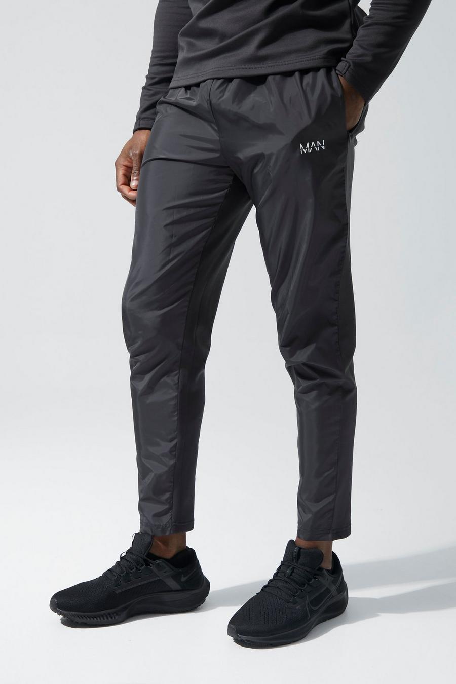 Charcoal Man Active Matte Panelled Tapered Joggers image number 1