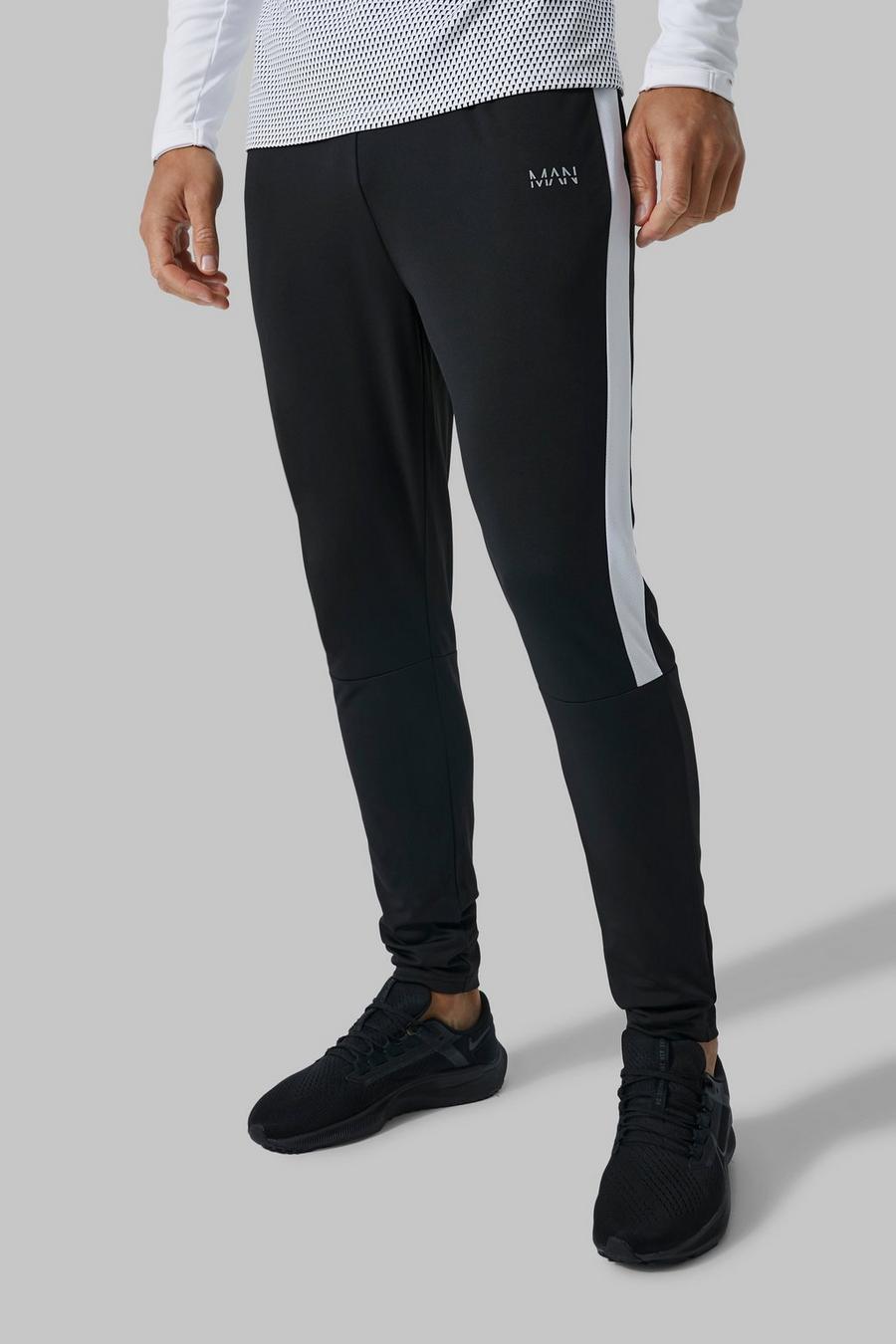 Pantalón deportivo Tall MAN Active resistente de fútbol, Black negro