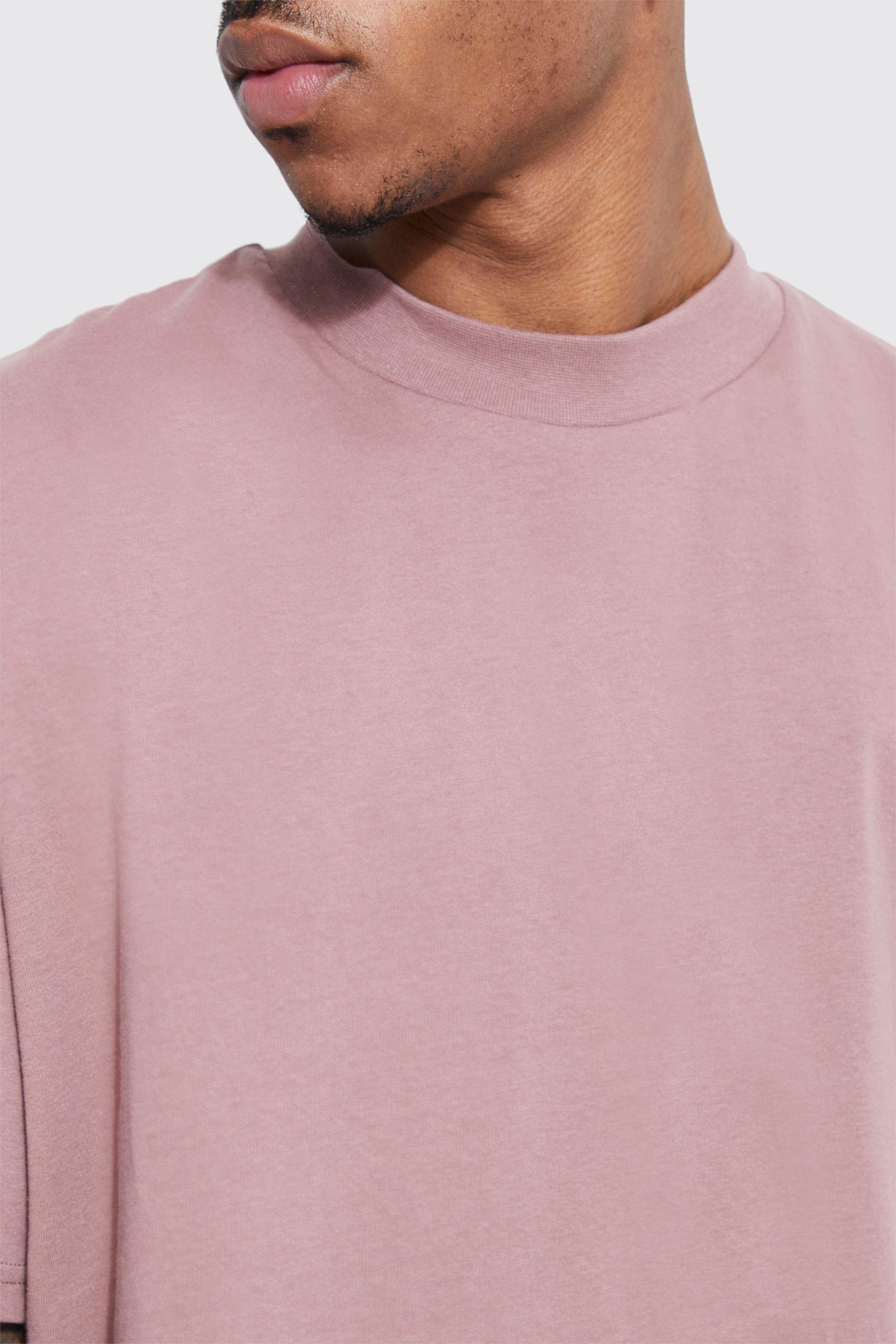 wearing a blank oversized heavy cotton blank pink t-shirt