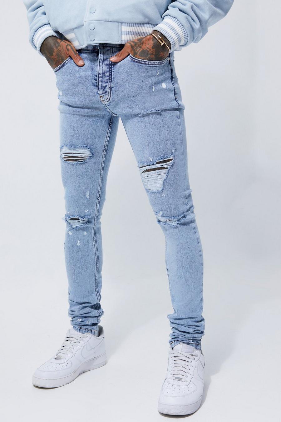 Light blue Super Skinny Stacked Ripped Paint Splatter Jeans image number 1