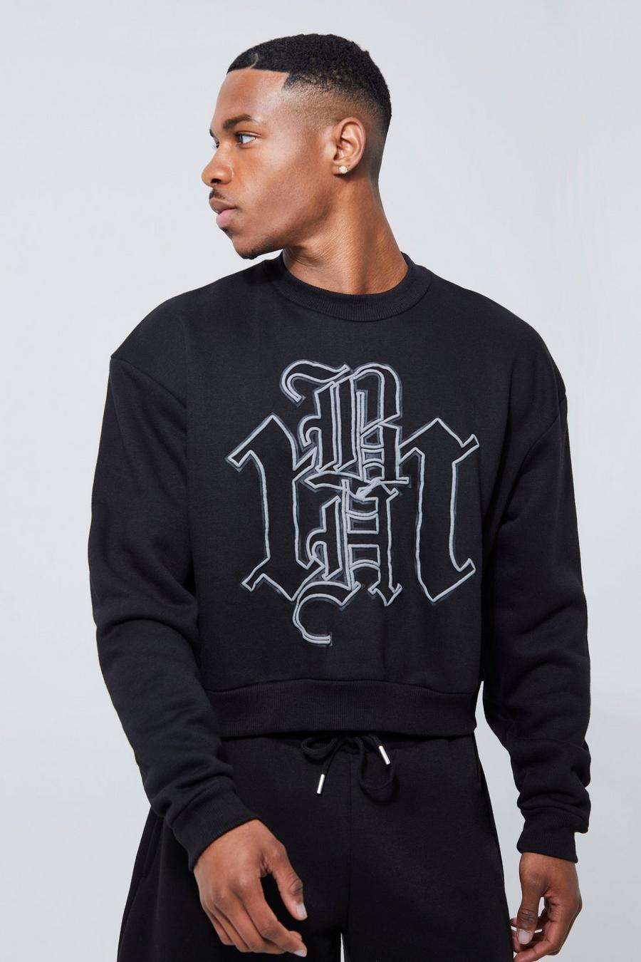 Black Oversized Cropped Emblem Graphic Sweatshirt image number 1
