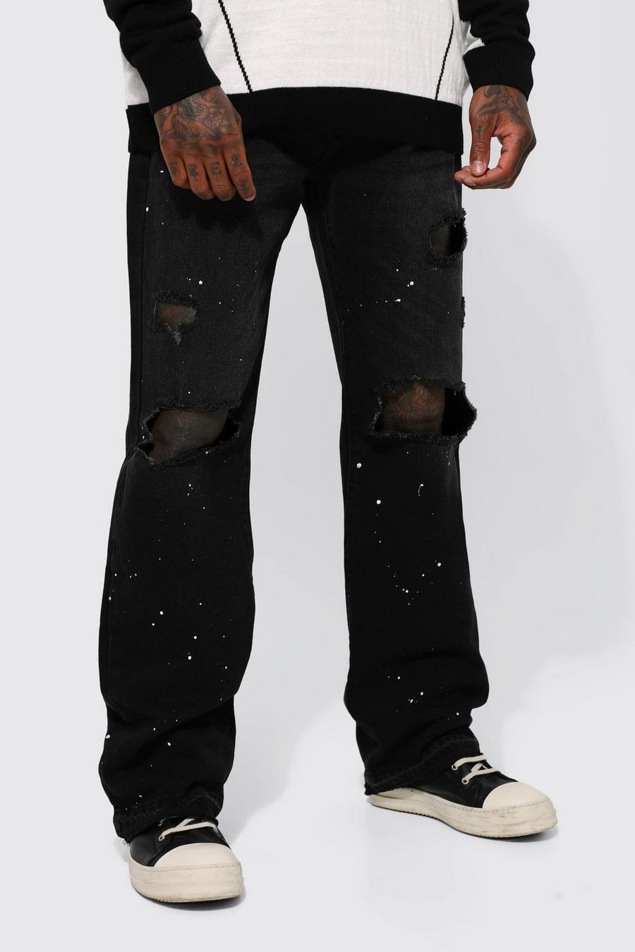 Washed black Slitna utsvängda jeans med färgstänk
