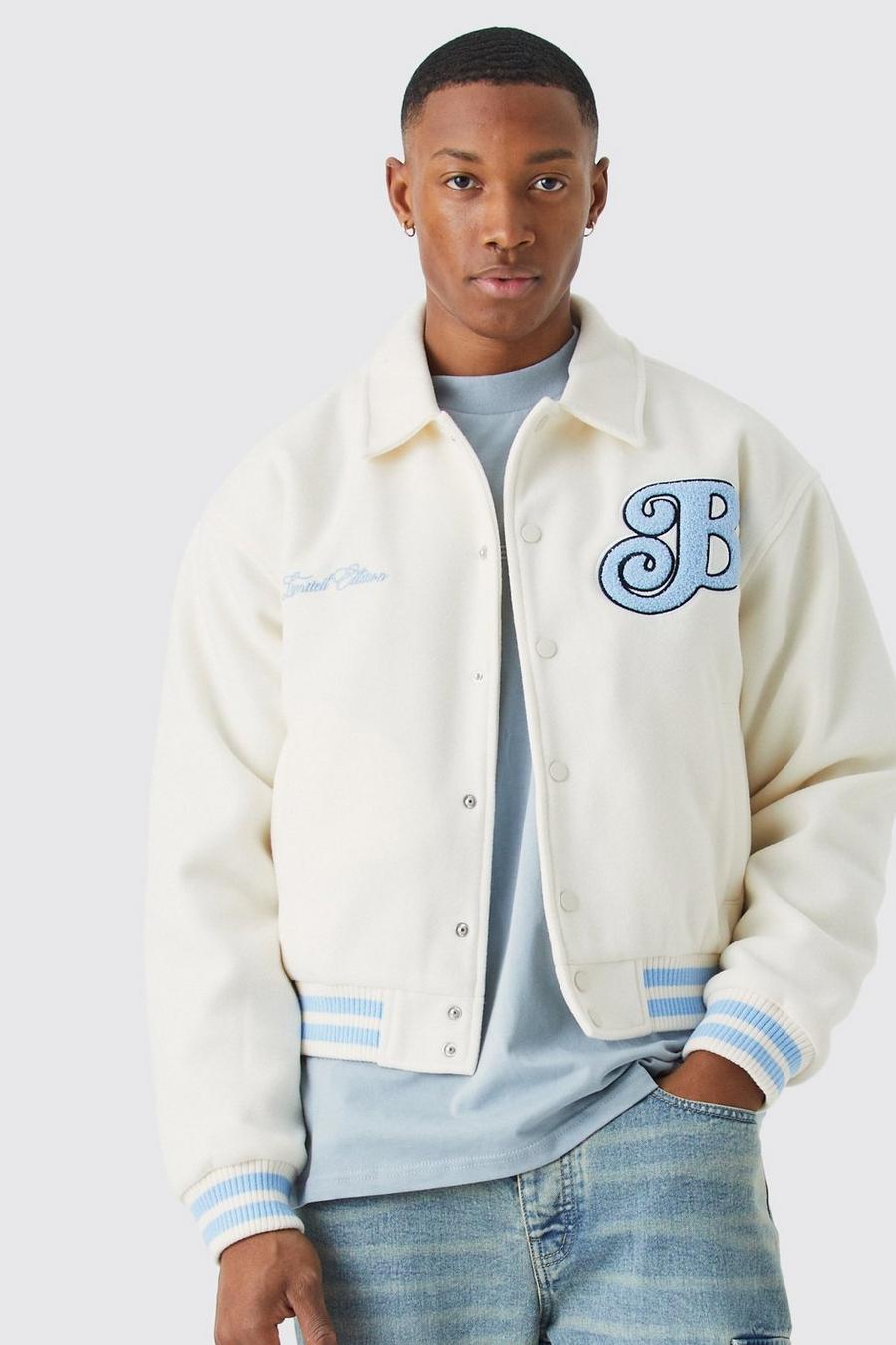 light blue and white varsity jacket