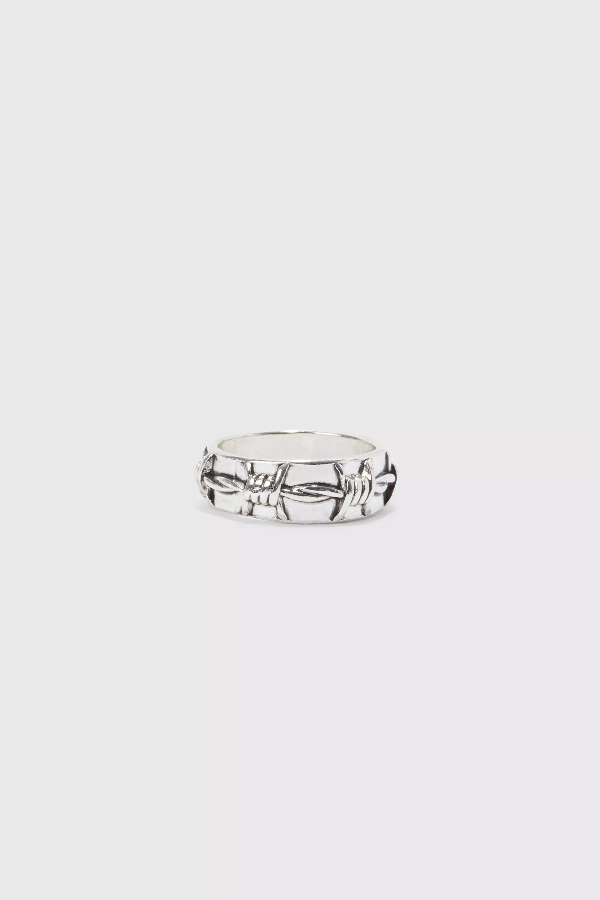 Barbed wire clearance ring meaning