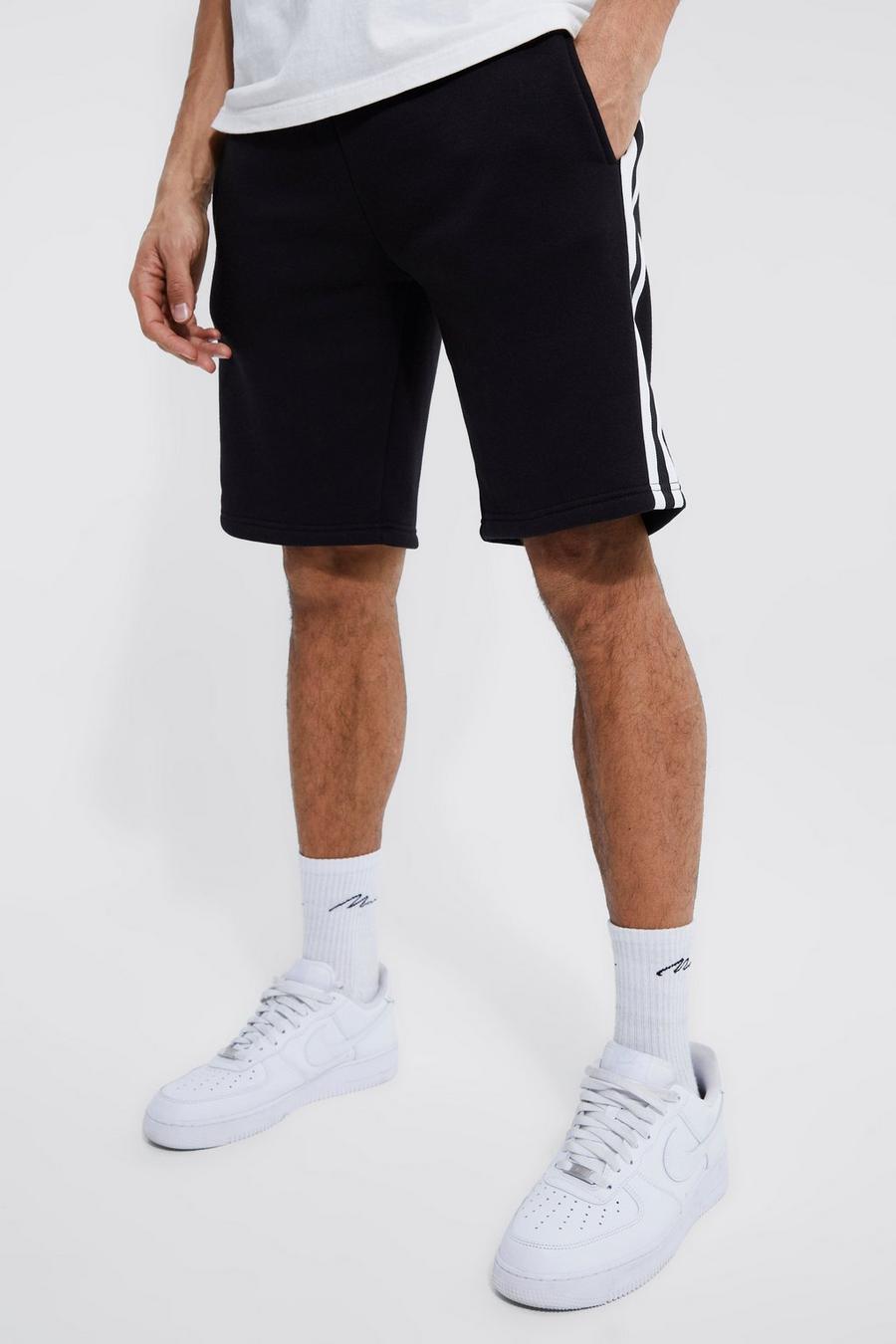 Black svart Tall Mid Length Jersey Short With Sports Tape image number 1