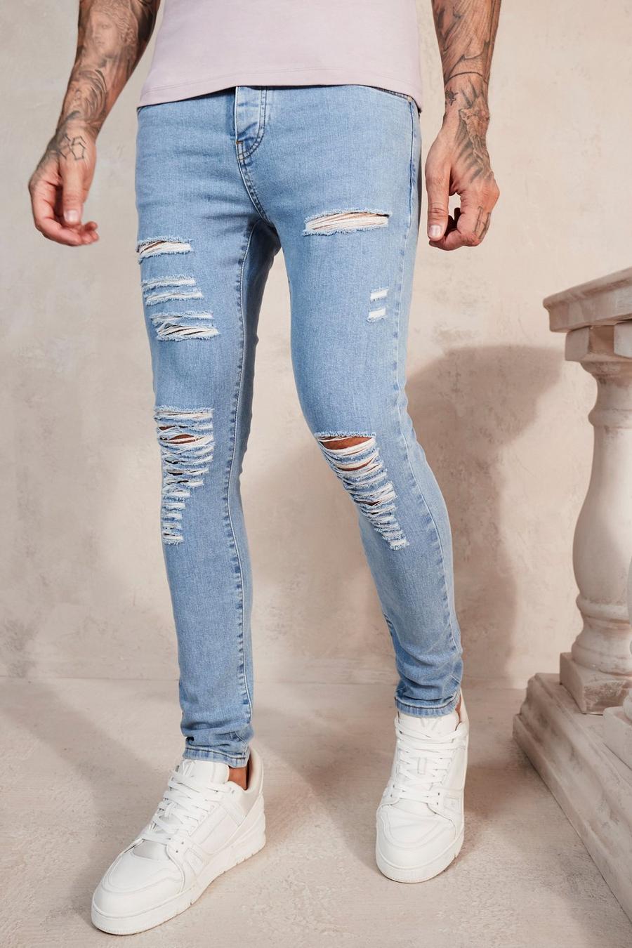 Light blue azzurro Super Skinny Jeans With All Over Rips image number 1