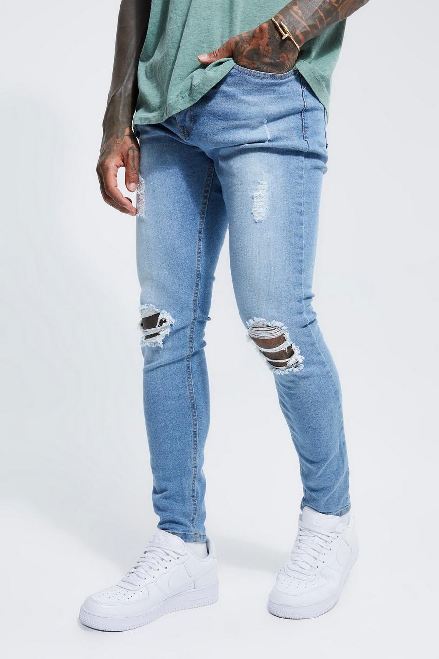 Light blue Skinny Stretch Exploded Knee Ripped Jeans image number 1